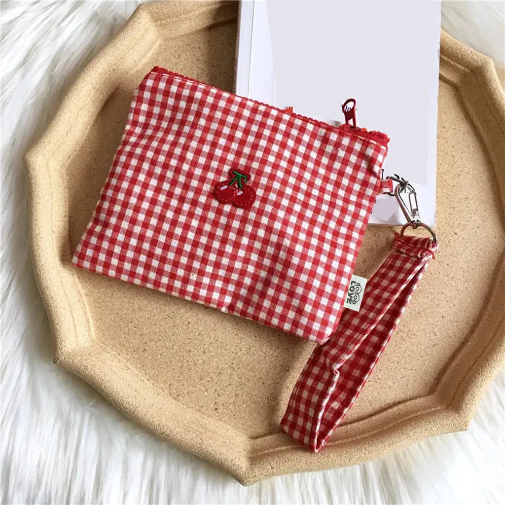 Red cherry canvas makeup bag, portable and easy to carry. Red plaid, large capacity cosmetic lipstick storage bag.